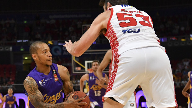 Obstacle: Jerome Randle meets a roadblock in the form of Damian Martin.