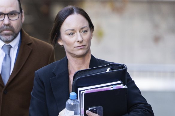 ACT Police Senior Constable Emma Frizzell arrives at the ACT Civil and Administrative Tribunal on Thursday.