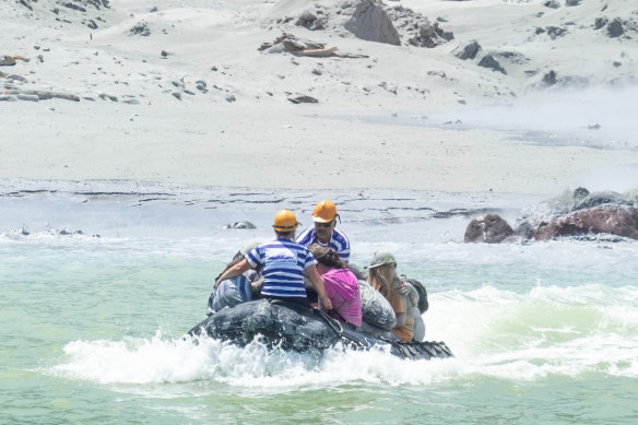 People are rescued from White Island minutes after the volcanic eruption.