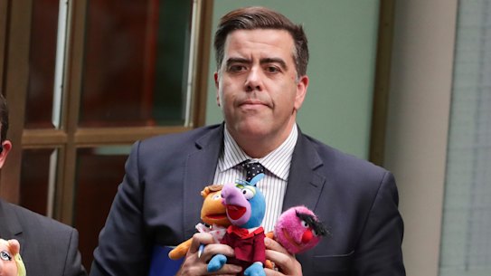 Luke Gosling and Milton Dick leave the chamber under 94a for bringing Muppets into Question Time.