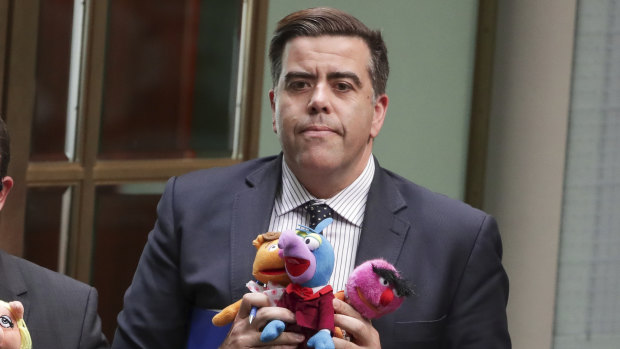 Luke Gosling and Milton Dick leave the chamber under 94a for bringing Muppets into Question Time.