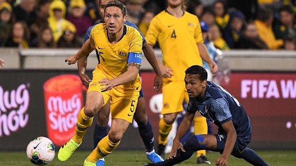 Socceroos captain Mark Milligan was convinced by Graham Arnold to continue his international career. 