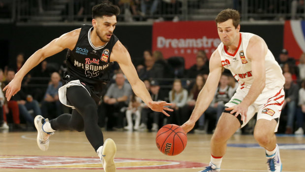 Thick of the action: Melbourne United versus Perth Wildcats.