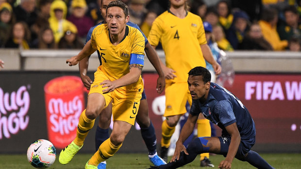 Socceroos captain Mark Milligan was convinced by Graham Arnold to continue his international career. 
