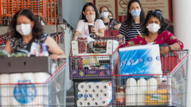 Shoppers stock up at Costco in Docklands, Melbourne before the five-day lockdown in Victoria.