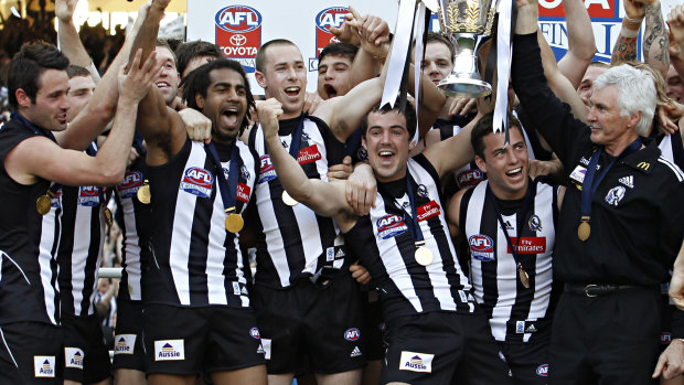 The victorious Magpies after the 2010 grand final replay.