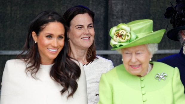 Meghan, Duchess of Sussex, and the Queen with Australian Samantha Cohen, this article’s author, behind them.