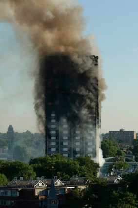 Smoke rises from Grenfell Tower in London.