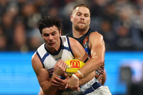 Geelong’s Ollie Henry is tackled.