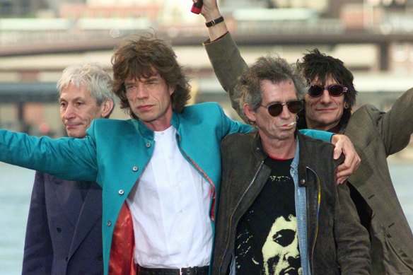 The Rolling Stones, then mere 50-somethings, announce their “Bridges to Babylon” tour beneath the Brooklyn Bridge in 1997. From left: Charlie Watts, Mick Jagger, Keith Richards and Ron Wood. 