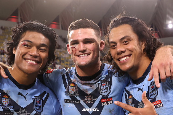Brian To’o, Jarome Luai and Nathan Cleary of the Blues pose after winning game one.