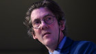 RBA deputy governor Andrew Hauser speaking in Brisbane on August 12.