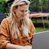 Working outside to soak up the sun? Be careful of your posture.