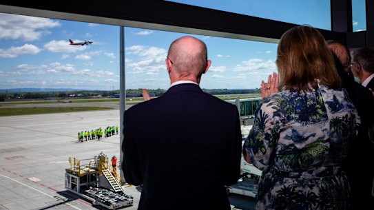 The inaugural flight at the brand new Western Sydney International Airport takes off as dignitaries watch on.