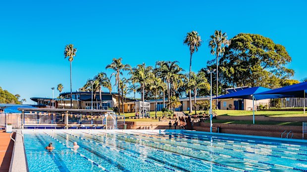Engadine Leisure Centre in Sydney’s southern suburbs features several outdoor pools and a grassy hill.