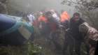 Rescue workers at the scene of the helicopter crash that killed Iran’s president and foreign minister this week.