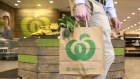 Woolworths' earnings will fall this year despite record sales growth. 