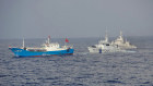 A suspected illegal Chinese fishing boat being monitored by the Japan Coast Guard.