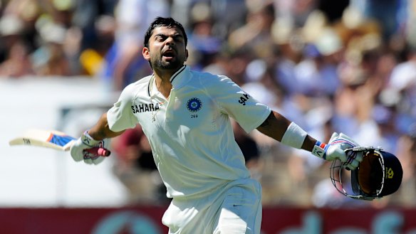 Sign of things to come: After failures in the first two Tests in Australia in 2012, Virat Kohli celebrates his first century in Adelaide.