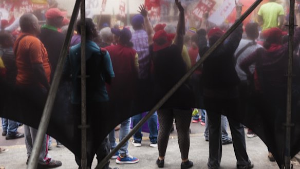 Pro-government supporters gather during an anti-imperialist rally in Caracas, Venezuela, on Saturday.
