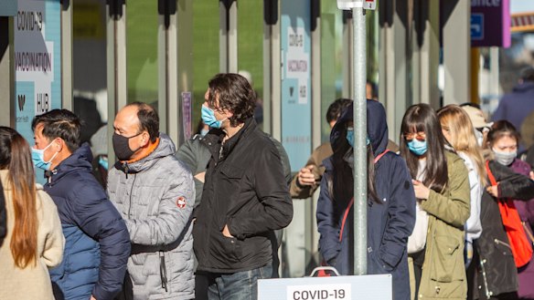 People queue for COVID-19 vaccines at Sunshine Hospital.