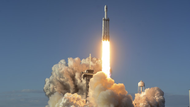 The Falcon Heavy lifts off from pad 39A at the Kennedy Space Center in Cape Canaveral, on Thursday.