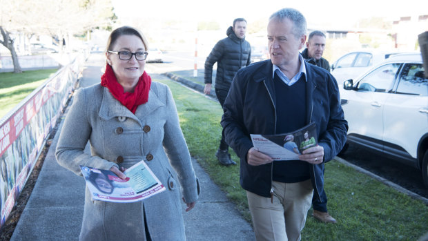 Labor candidate for Braddon Justine Keay and Opposition Leader Bill Shorten hand out fliers in Devonport.