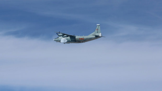 China's Y-8 electronic warfare aircraft flies over the East China Sea in a photo taken by a Japan Air Self-Defence Force jet during its scramble in April.