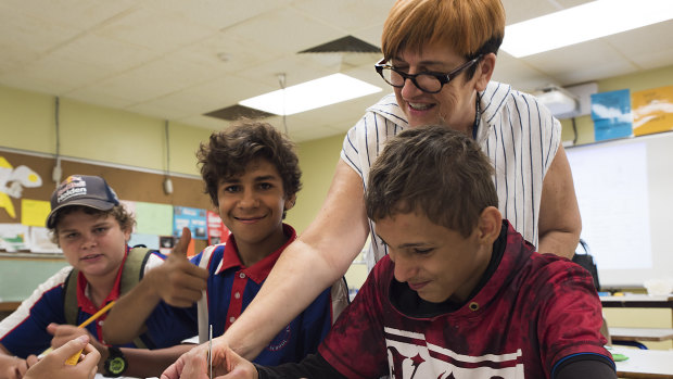 Jane Franklin with high school students in Katherine.