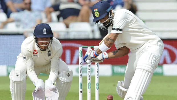 Fine form: Virat Kohli (right) was once again India's leading light with the bat.