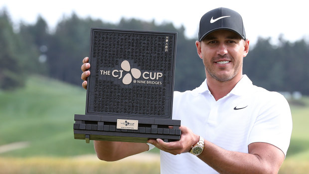 Dominant: Brooks Koepka winning the CJ Cup on Sunday as he moved atop the world rankings.