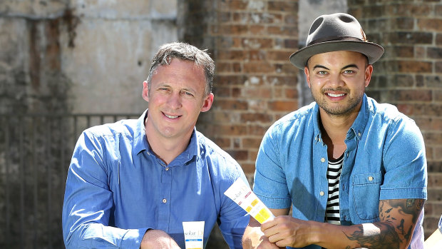 Guy Sebastian and his former agent Titus Day (left).