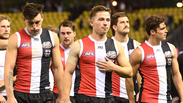 Jack Billings, centre, has weighed in on the possibility of coronavirus affecting St Kilda's match schedule. 