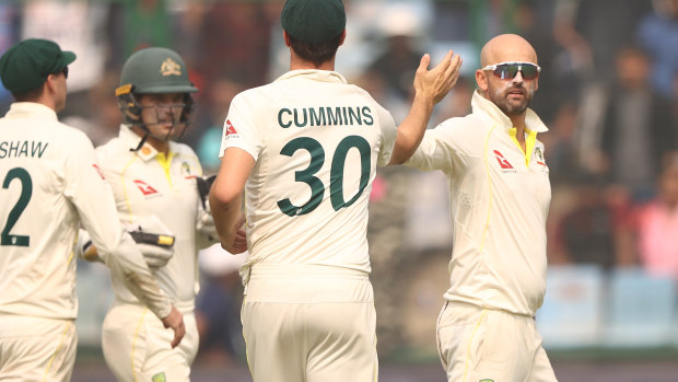 Nathan Lyon celebrates taking a wicket during this year’s Test series against India.