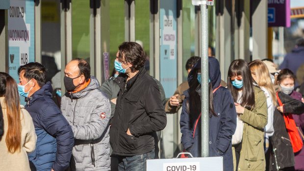 People queue for COVID-19 vaccines at Sunshine Hospital.