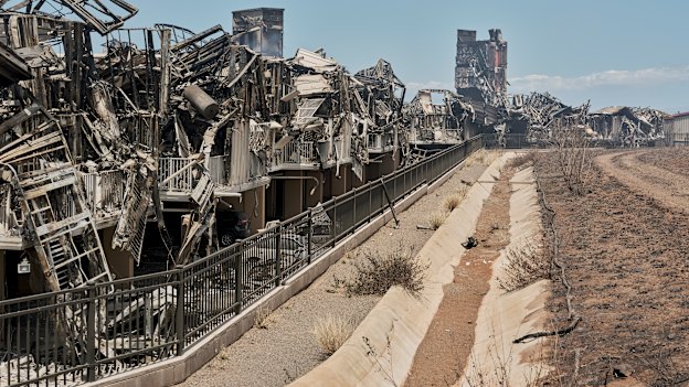 Residential buildings destroyed by a fast-moving wildfire in Lahaina, Hawaii.