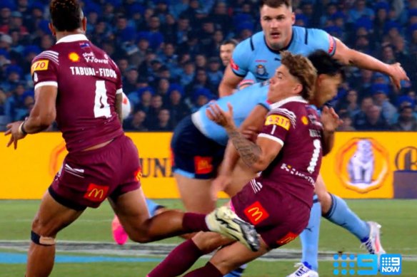 A screengrab of State of Origin II promotion showing Reece Walsh being taken out by Joseph Suaalii in game one in Sydney.