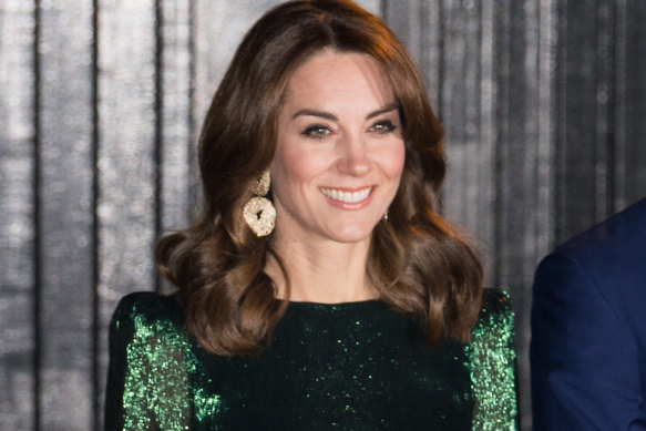 The Duchess of Cambridge wearing an emerald metallic silk Falconetti dress by The Vampire’s Wife in March, 2020.
