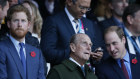 Prince Harry, Prince Philip and Prince William at a rugby match in 2015. 
