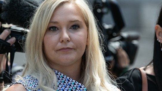 Giuffre (centre) leaving a New York Federal Court in 2019.