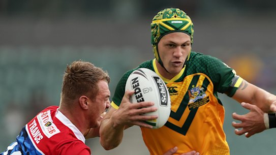 Junior Kangaroos five-eighth Kalyn Ponga spots a gap against France in Wollongong on Friday.