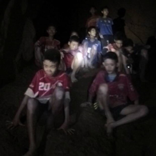 The first sighting of the 12 soccer players trapped in Thailand's Tham Luang cave complex.