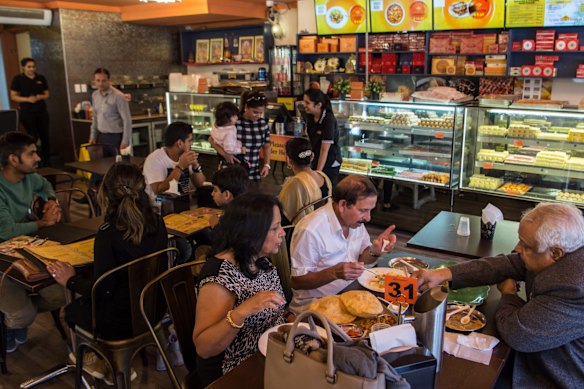 A display of hundreds of sweets greet diners. 