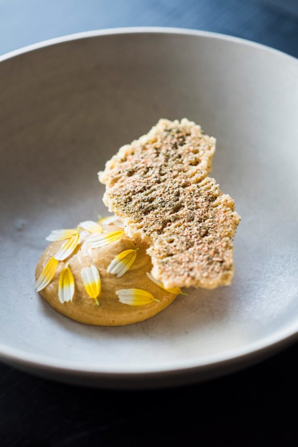 Salted white chocolate, carrot cream, chrysanthemum.