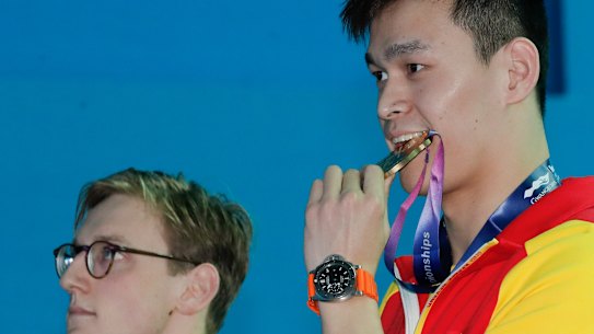  Horton, in silent protest,  refuses to take the podium beside China's Sun Yang.