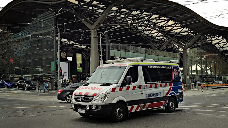 Man charged with attempted murder after paramedic stabbed in face and neck