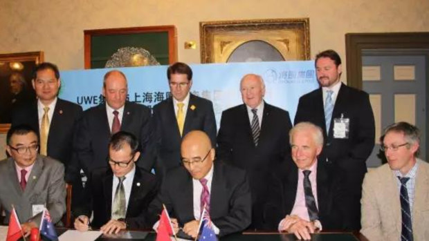 Former MP Daryl Maguire (top row, second from left), Member for Tamworth Kevin Anderson, Jim Harrowell and Jimmy Liu (bottom row centre) at the signing of a beef and aged care investment project agreement in 2017.