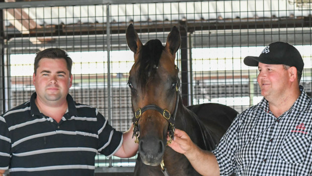 Richard Litt, left, with his Magic Millions sale-topping Deep Impact colt.