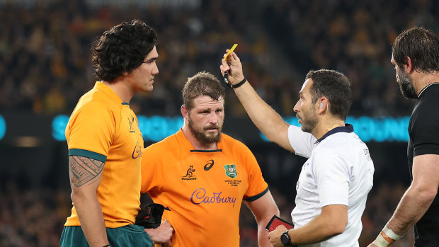 Darcy Swain is shown a yellow card for a dangerous tackle on Quinn Tupaea.