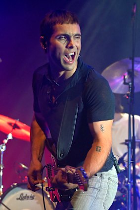 Louis Parsons, lead singer and guitarist for Melbourne rock band Floodlights, performs on stage at the Forum on May 24, 2025